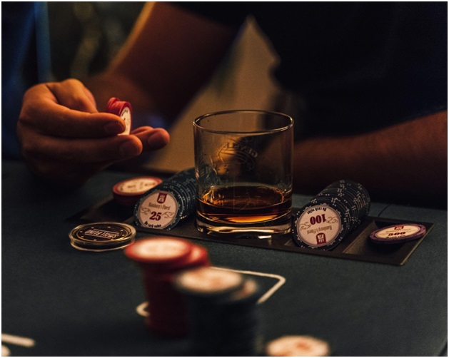 Picture with chips and a glass of whiskey