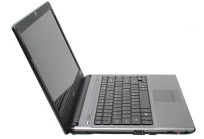 A thin notebook and a long battery with a netbook Picture 1
