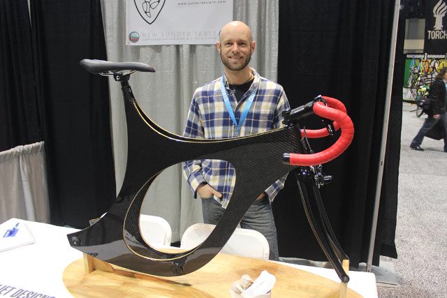 Carbon and wood combine together in an oddly curved bike Picture 1