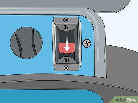 How to Adjust an Abrasive Stone on a Bench Grinder Picture 11