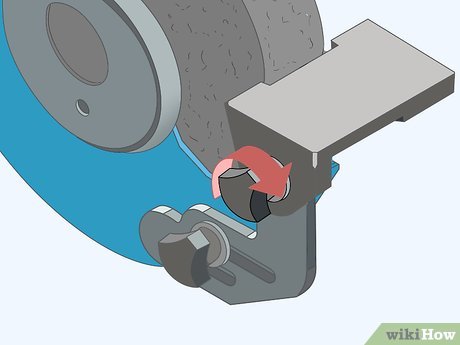 How to Adjust an Abrasive Stone on a Bench Grinder Picture 4