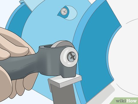 How to Adjust an Abrasive Stone on a Bench Grinder Picture 9