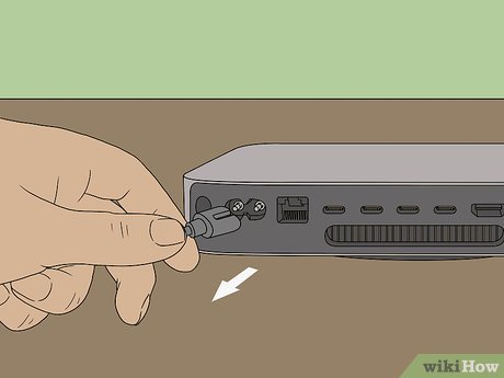How to Open a Mac Mini Picture 1