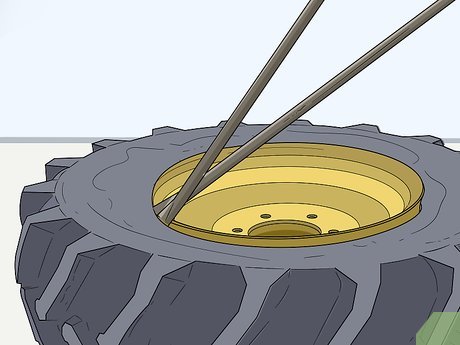 How to Remove a Tractor Tire from the Rim Picture 9