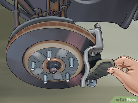 How to Replace Brakes on a John Deere 5105 Tractor Picture 12