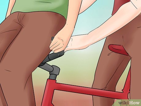 How to Ride a Bike With Two People Picture 6