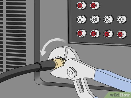How to Unscrew a Coaxial Cable From Audiovisual Equipment Picture 5