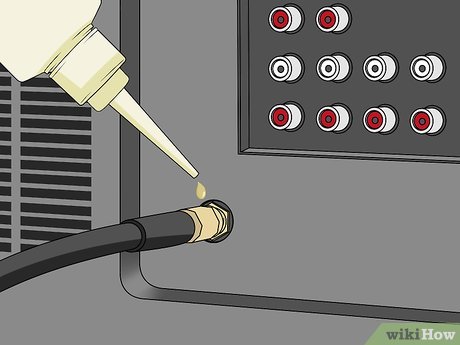 How to Unscrew a Coaxial Cable From Audiovisual Equipment Picture 6