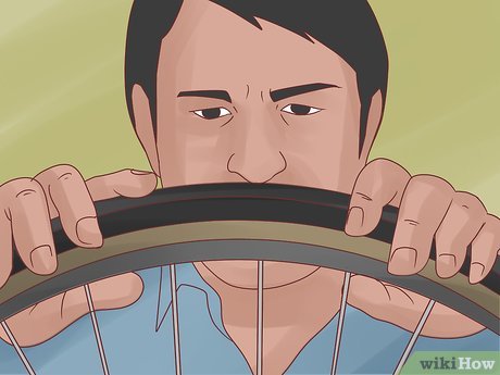 How to Unwobble a Bicycle Rim Picture 11