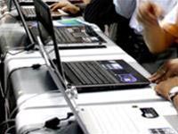 In 2007, how much did the laptop price drop? Picture 1