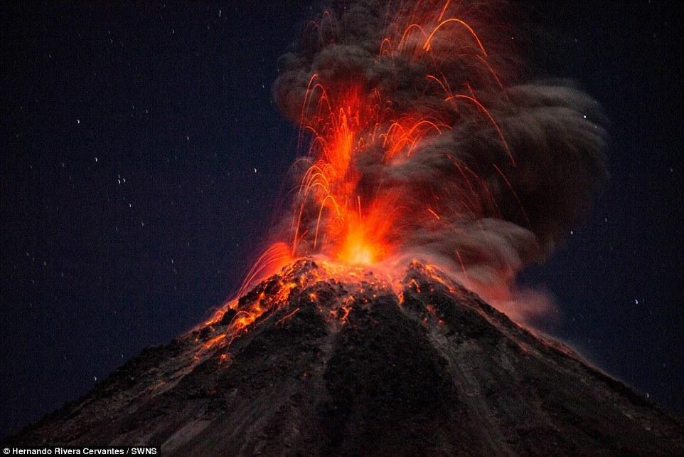 Stunned the impressive moment when lightning struck the crater that was erupting Picture 3