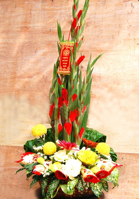 The unique flower arrangement patterns to discuss the Tet festival's day and fortune Picture 1