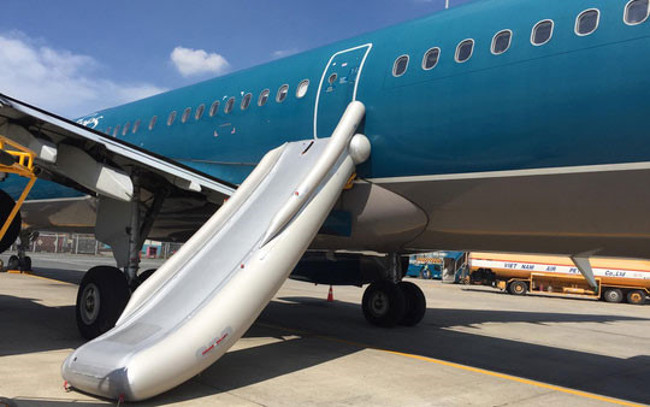 What if the emergency exit door is open while flying? Picture 3