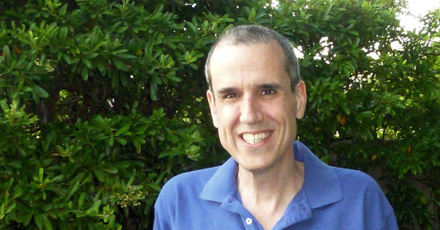 A Programmer Writes an Operating System to Communicate with God Through Computers