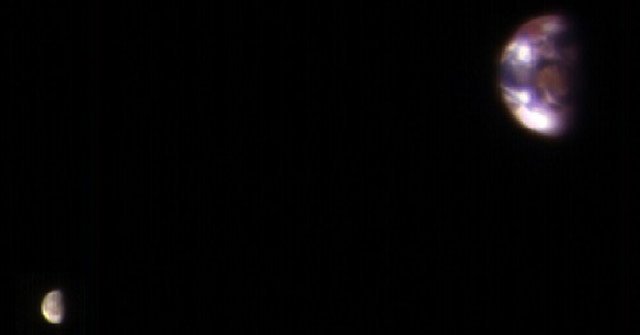 Admire the Unique Photograph of the Moon and Earth Taken