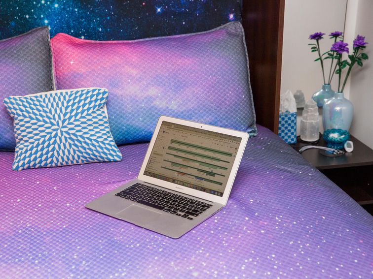 How to Work from Bed Ergonomically Even Though Everyone Says