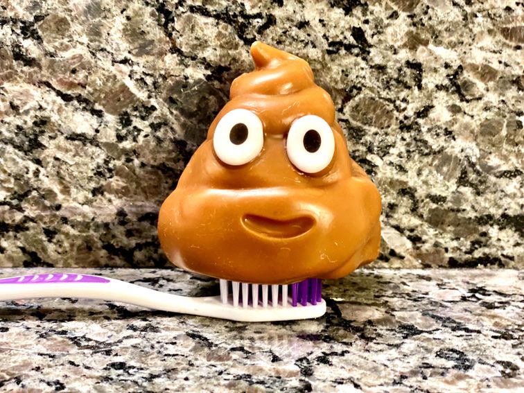 Is Your Toothbrush Covered in Poop? Here's How to Thoroughly