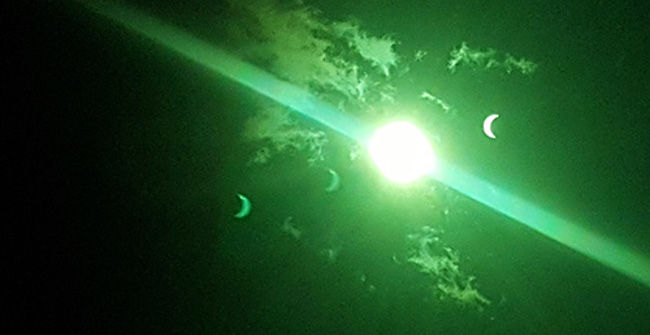 Mysterious Blue Crescent Decoding in Many Photos of Total Eclipse