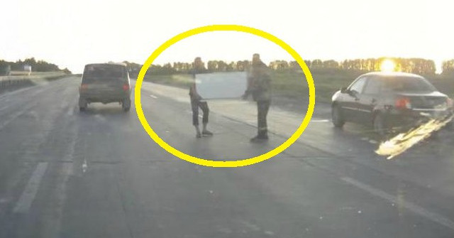 Shiver of Strange Scenes: the Two Men Carrying the Fridge Cross