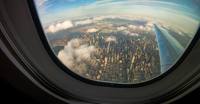 Take Beautiful Photos on the Plane with the Following Tips