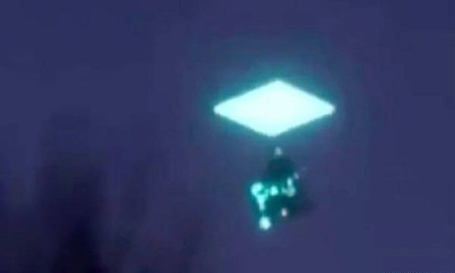 UFO Object Disappears Through Mysterious Light Cells in the Sky