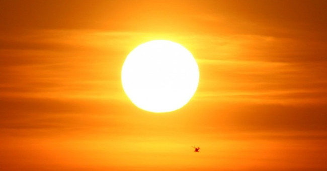 Use the Sun's Gravity to Transmit Interstellar Signals