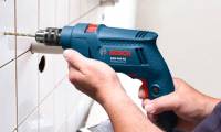 Buy a table drill or portable drill