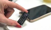 Check the durability of the smallest phone in the world and unexpected results
