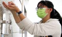 Disinfect COVID-19 epidemic respirator mask with a microwave