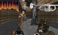 Forget the keyboard and mouse, just a trumpet this guy can kill the monsters in the game 'Doom'