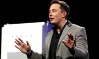 How much time does Elon Musk run for two famous technology companies?