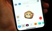 How to open photo albums in the messaging application on iPhone