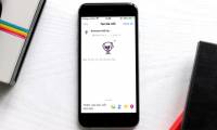 How to post Facebook status with sticker