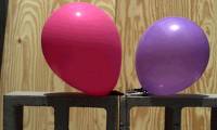 Labeled with the bullet being cut in half, shooting two balls at 28,500 frames per second