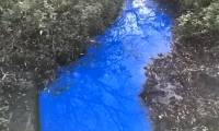 Mysterious stream turns strange blue in England