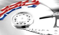 Schedule Windows XP to defragment the disk