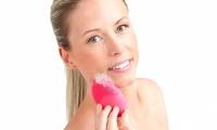 Should a face wash machine be used for acne skin?