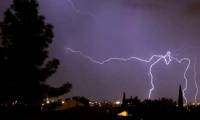 Sitting and playing games under a tree in stormy weather, 2 Filipino youths were struck by lightning