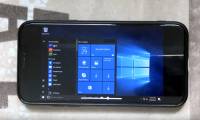 The iPhone runs iOS is normal, this iPhone X runs both Windows 10 complete