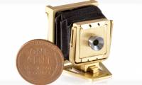 The photographer created the world's smallest working folding camera, just a little bigger than a coin