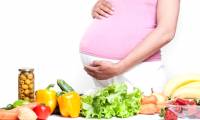 The pregnant woman is anemic and should eat well for her mother and baby