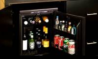 What is a Minibar?  Why is furniture in a hotel minibar fridge so expensive?