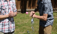 Why do you smash the glass bottle with your hand, the bottom part breaks?