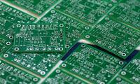 Why is the Apple printed circuit board black while most other manufacturers are green?