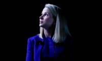 Yahoo CEO overslept, giving partners 'climbing trees'