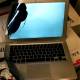 Photo of Air Macbook 'hits' the bus and 'survives'