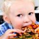 Photo of Children eat snacks related to father's income and education?