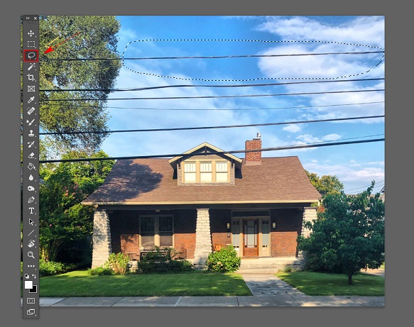 Picture 1 of How to Remove Power Lines in Photoshop