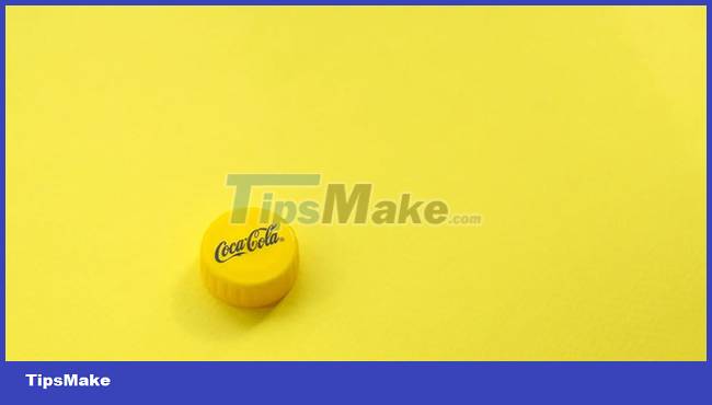 What does the yellow Coca-Cola bottle cap mean? Picture 4