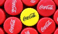 What does the yellow Coca-Cola bottle cap mean?